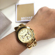 Michael Kors Runway Twist Gold Dial Gold Steel Strap Watch for Women - MK3131